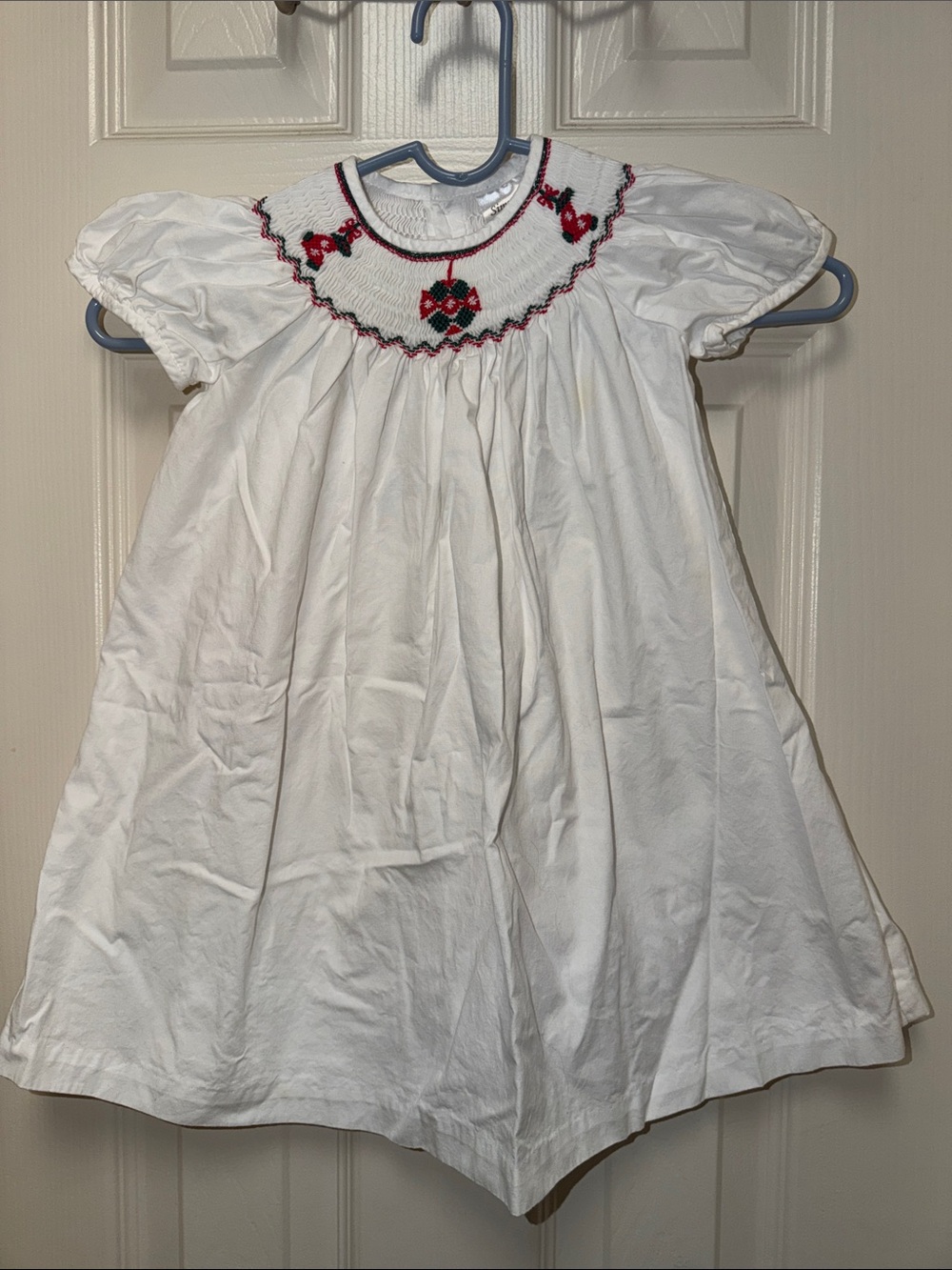 White Smocked Girls' Casual Dress with Red Accent Embroidery